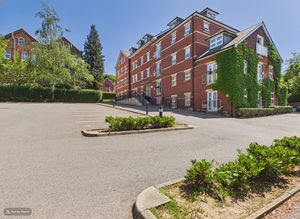 FRONT ASPECT FROM RESIDENTS PARKING AREA- click for photo gallery